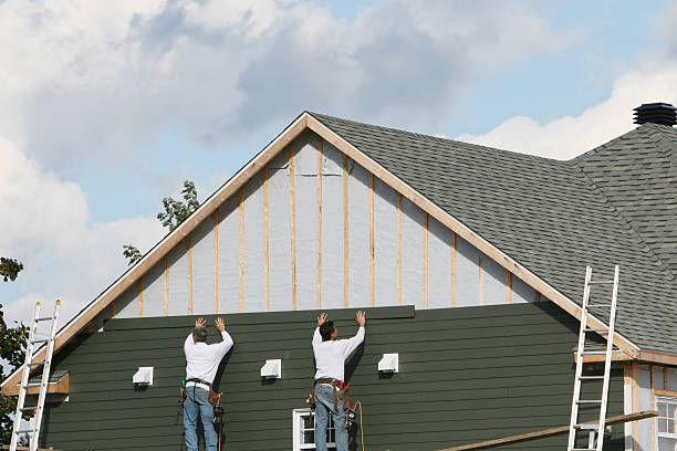 Professional Siding technician working in Windsor, PA